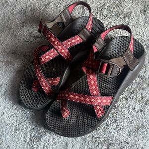 Chaco red orange and a hint of white sandals.  In GUC